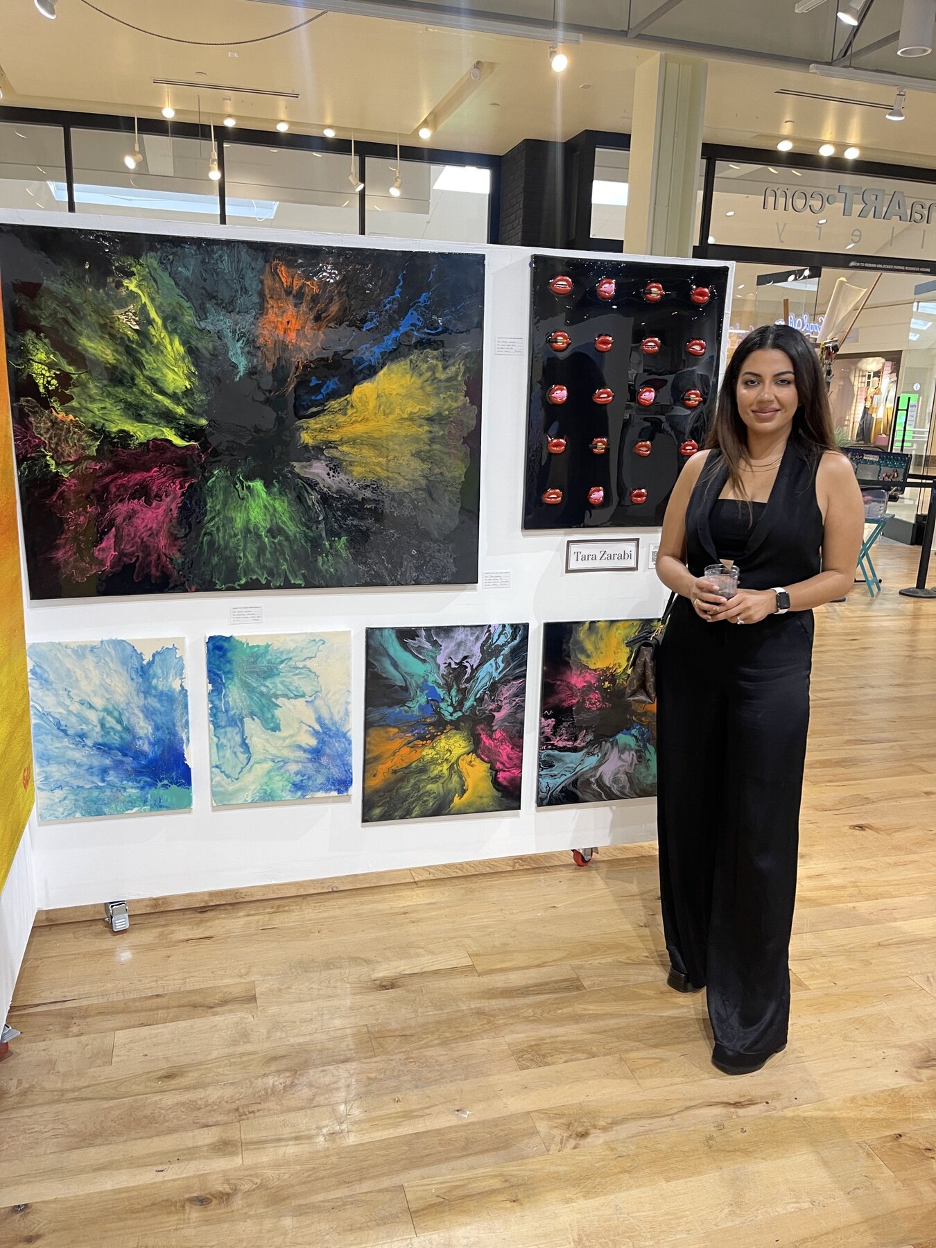 Tara Zarabi with her original artworks at her 2020 Laguna Art Gallery exhibition